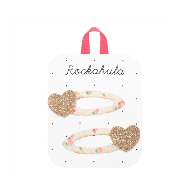 A pack of two gold glittery hearts, set upon pretty tiny blossom ribbon wrapped snap clips. These glittery heart shaped clips are loveable in every way!