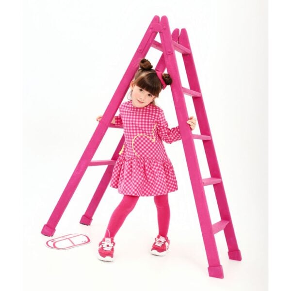 A charming bright pink dress set for girls by Agatha Ruiz de la Prada. Made in soft cotton-blend jersey, the dress features a vibrant gingham check pattern with a playful yellow heart design. It has a stylish dropped waist and a gathered skirt, with practical poppers on the back. The coordinating fuchsia tights have heart and logo motifs for a signature finish.