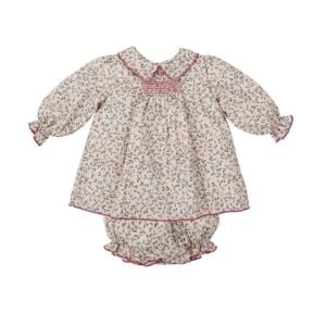 This pretty beige dress for girls by Babidu, has a beautiful leaf print in muted shades of blue and pink.