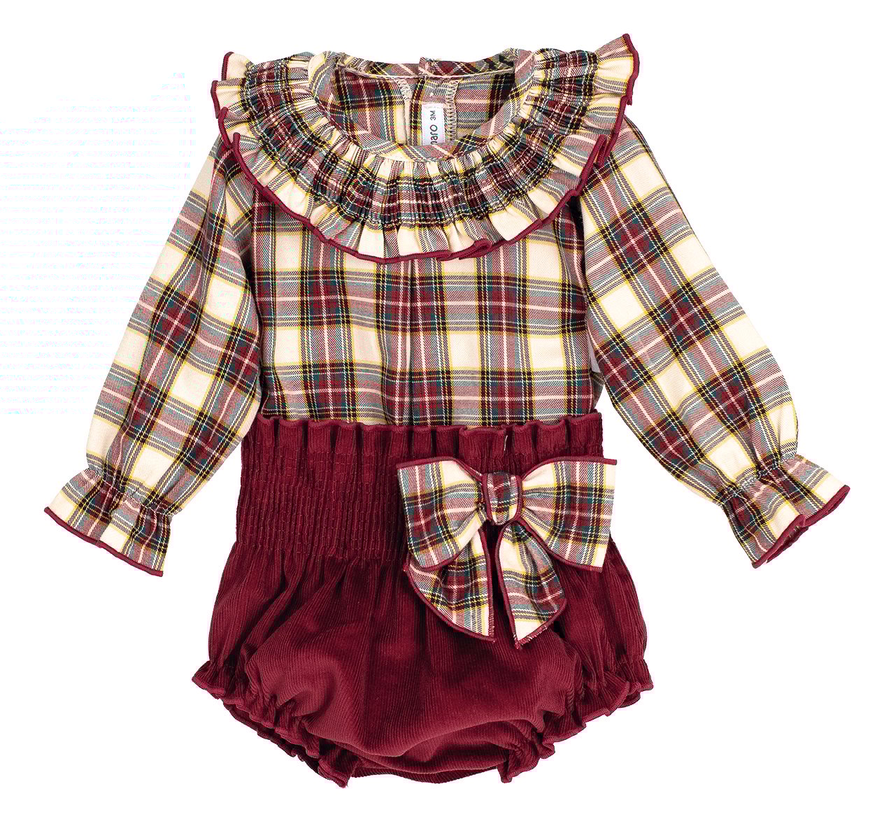 A classic pairing for the cosiest time of year. This blouse and bloomers set from Calamaro features a super soft, super lightweight tartan blouse in rich burgundy, oatmeal, and bottle green – with gentle smocking around the frilled neckline and elasticated wrists for a snug, comfy fit. The coordinating bloomers are crafted from soft burgundy needlecord, with a stretchy shirred waistband and matching tartan bow. A beautifully put-together outfit for wintry days, Christmas parties, or curling up by the fire.