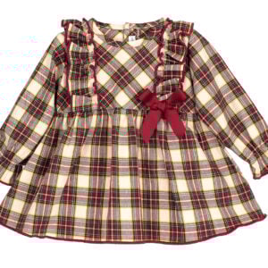 Sweet, soft, and timeless – this festive tartan dress from Calamaro is perfect for twirling through the season. Designed in a beautifully lightweight cotton, it features rich tones of burgundy, oatmeal, yellow, and bottle green, with gentle ruffles that sweep over the shoulders and a grosgrain bow that sits neatly at the waist. The full skirt adds a classic silhouette, and the elasticated wrists make everyday wear fuss-free. A lovely choice for Christmas Day, family gatherings, or any moment that calls for a little extra magic.