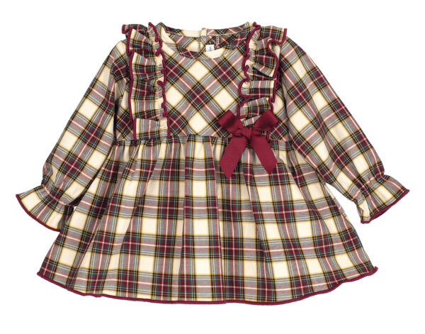 Sweet, soft, and timeless – this festive tartan dress from Calamaro is perfect for twirling through the season. Designed in a beautifully lightweight cotton, it features rich tones of burgundy, oatmeal, yellow, and bottle green, with gentle ruffles that sweep over the shoulders and a grosgrain bow that sits neatly at the waist. The full skirt adds a classic silhouette, and the elasticated wrists make everyday wear fuss-free. A lovely choice for Christmas Day, family gatherings, or any moment that calls for a little extra magic.