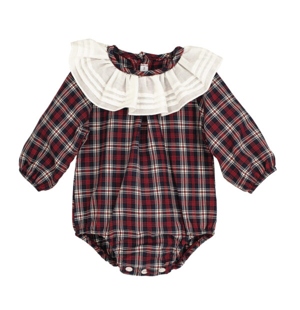 There’s something undeniably nostalgic about this piece from Calamaro – like something you'd spot in an old photograph, worn by a baby sitting wide-eyed by the tree. Made from soft, super lightweight tartan cotton in festive shades of navy, red and white, this unisex romper is topped with a showstopping pleated white collar for a classic Christmas finish. The gently elasticated cuffs and legs keep your little one comfortable all day long, while pearlised buttons down the back and crutch make changes a breeze. Pair with tights or knee socks and a cardigan to complete the look.